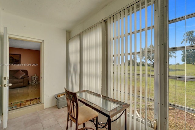 sunroom / solarium featuring a wealth of natural light