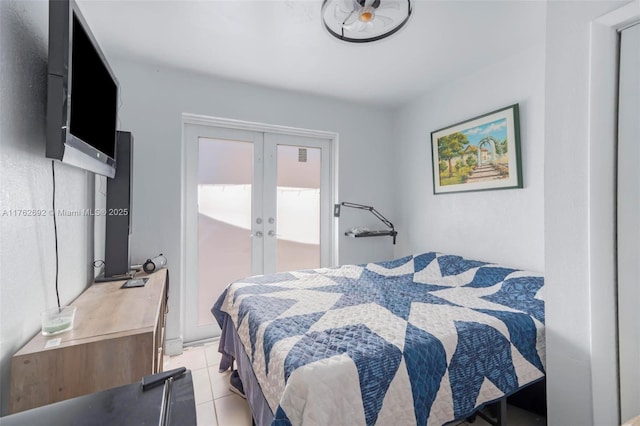 bedroom with light tile patterned flooring and french doors