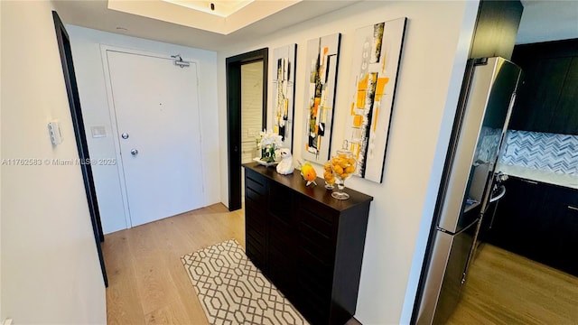 hallway featuring light wood-style floors