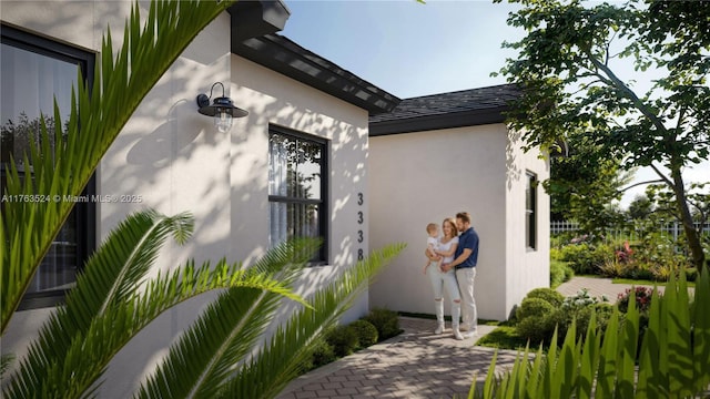 view of property exterior with stucco siding