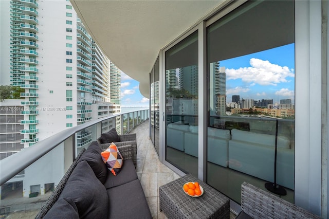 balcony featuring a view of city