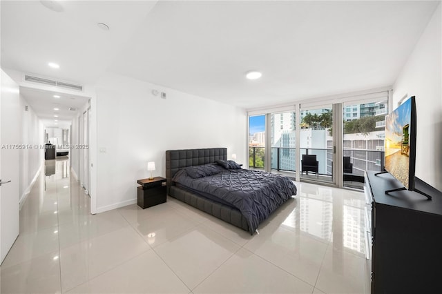 bedroom with access to exterior, visible vents, baseboards, light tile patterned floors, and recessed lighting