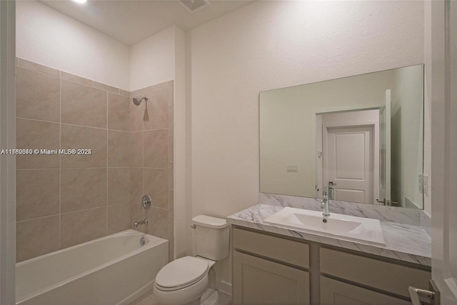 full bathroom featuring vanity, toilet, and shower / bathtub combination