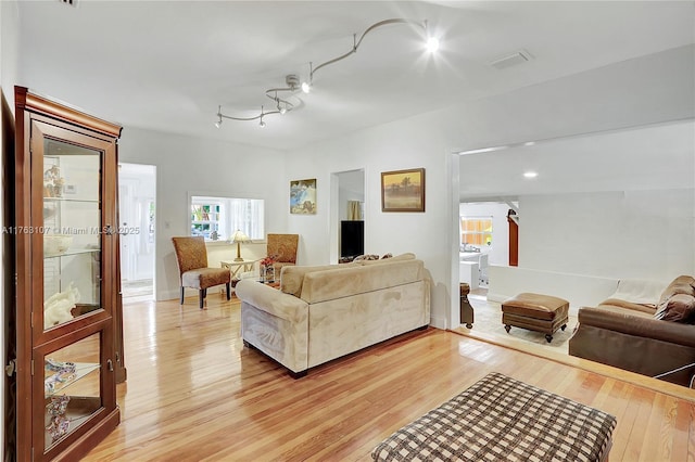 living room with light wood finished floors