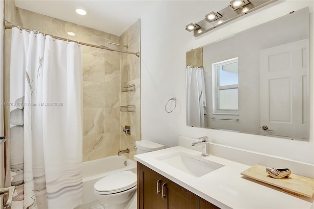 full bath with toilet, shower / tub combo with curtain, and vanity