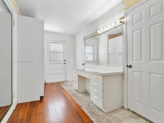 bathroom featuring vanity and wood finished floors