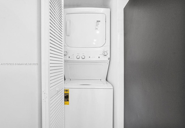 laundry room featuring laundry area and stacked washing maching and dryer