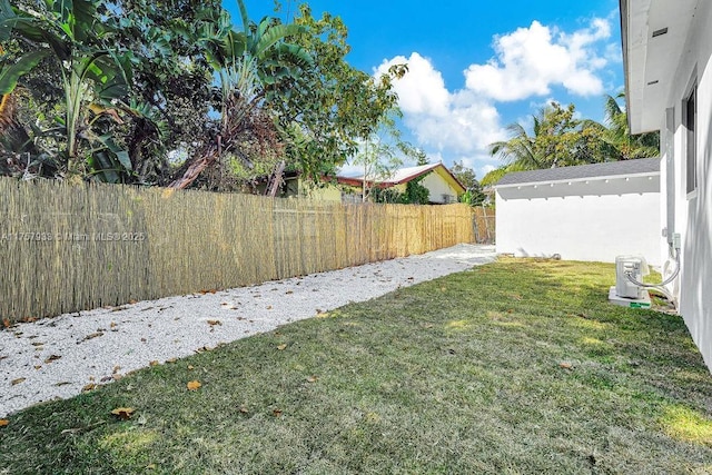 view of yard with a fenced backyard