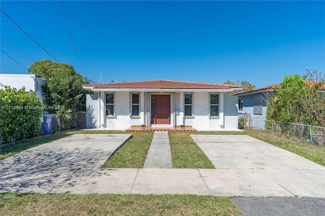 232 NW 58th Ct, Miami, FL 33126 - bungalow featuring fence, covered porch, and stucco siding