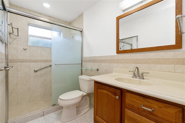 232 NW 58th Ct, Miami, FL 33126 - bathroom with tile patterned floors, a wainscoted wall, toilet, a stall shower, and vanity