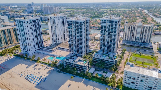 aerial view featuring a view of city and a water view