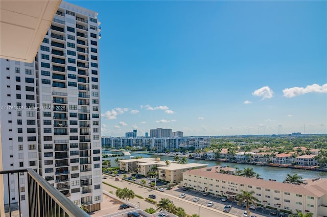 exterior space featuring a water view and a view of city