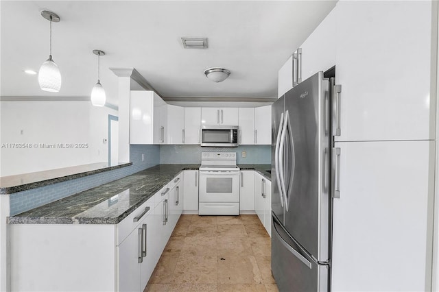 kitchen with visible vents, dark stone countertops, stainless steel appliances, white cabinets, and decorative backsplash