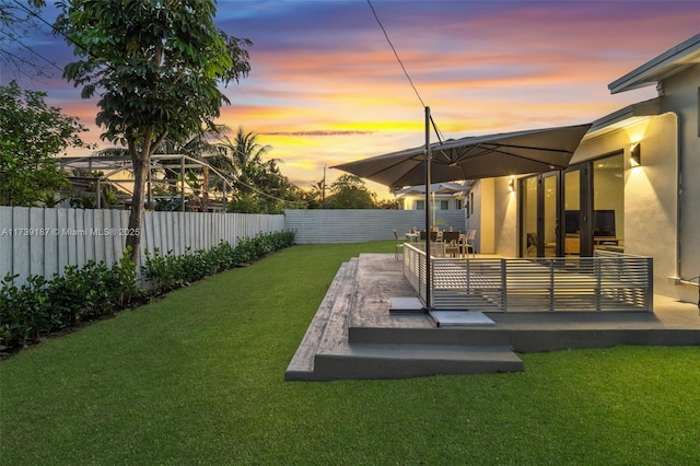 view of yard with a fenced backyard