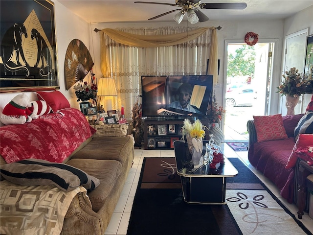 living room featuring tile patterned floors and ceiling fan