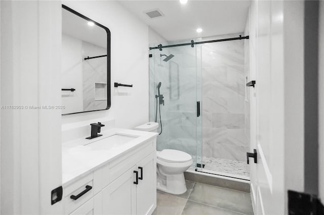 bathroom with a marble finish shower, visible vents, toilet, and vanity