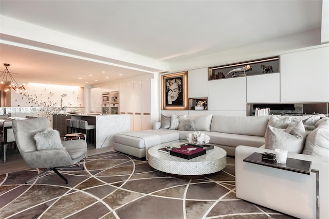 living area with an inviting chandelier