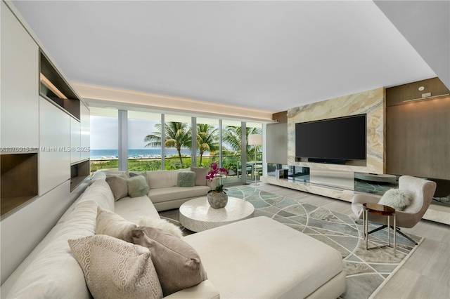 321 Ocean Dr Unit 200, Miami Beach, FL 33139 - living area featuring wood finished floors and floor to ceiling windows