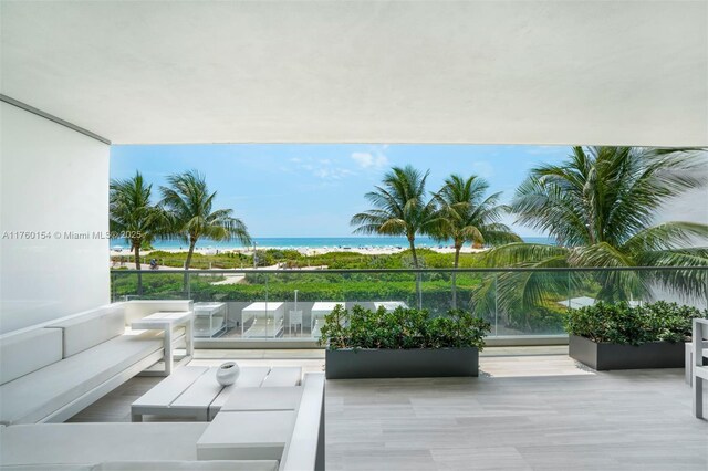 321 Ocean Dr Unit 200, Miami Beach, FL 33139 - balcony featuring an outdoor hangout area and a water view