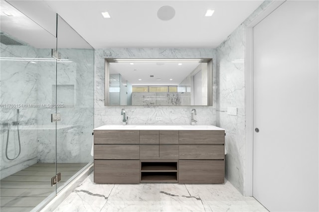 321 Ocean Dr Unit 200, Miami Beach, FL 33139 - full bathroom with marble finish floor, a sink, a marble finish shower, and double vanity