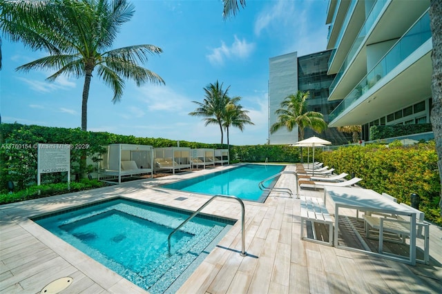 321 Ocean Dr Unit 200, Miami Beach, FL 33139 - pool featuring fence, a community hot tub, and a patio