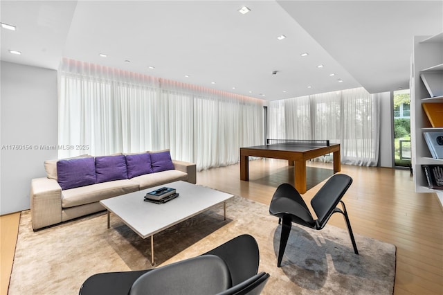 321 Ocean Dr Unit 200, Miami Beach, FL 33139 - recreation room with wood finished floors and recessed lighting