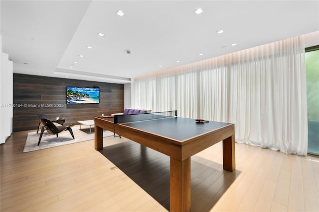 321 Ocean Dr Unit 200, Miami Beach, FL 33139 - rec room featuring wood finished floors, wooden walls, and recessed lighting