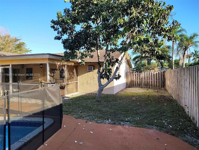 view of yard with a patio and a fenced backyard