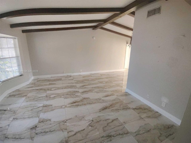 unfurnished room with vaulted ceiling with beams, baseboards, visible vents, and marble finish floor