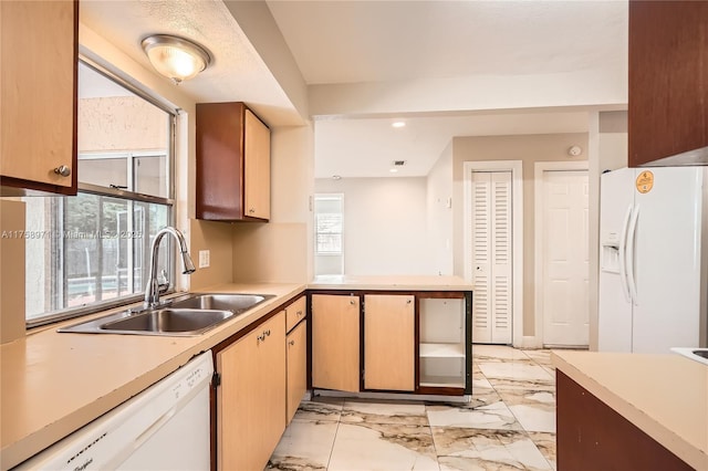 1281 Wyndcliff Dr, Wellington, FL 33414 - kitchen with marble finish floor, a sink, white appliances, a peninsula, and light countertops