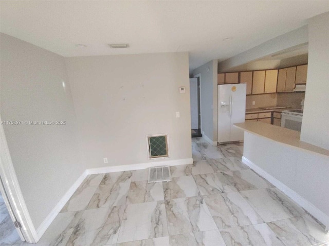 kitchen with visible vents, marble finish floor, white appliances, light countertops, and baseboards