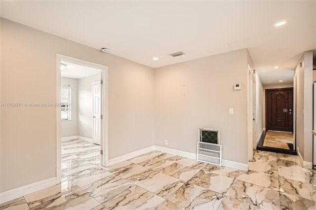1281 Wyndcliff Dr, Wellington, FL 33414 - empty room with recessed lighting, visible vents, marble finish floor, and baseboards