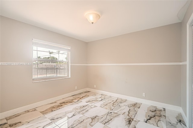 1281 Wyndcliff Dr, Wellington, FL 33414 - empty room with baseboards and marble finish floor