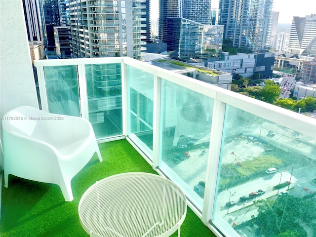 balcony featuring a view of city