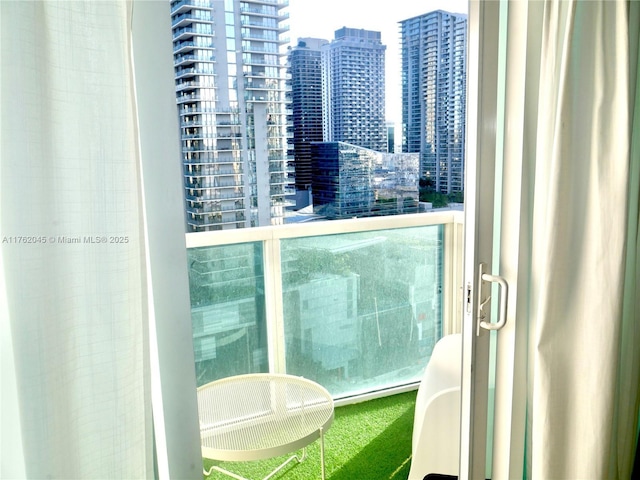 bathroom featuring a city view