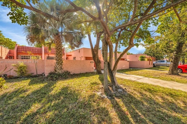 view of yard with a fenced front yard