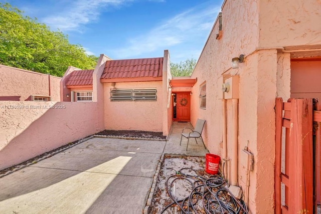 view of patio / terrace with fence