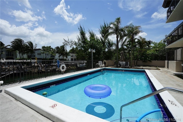 community pool with fence