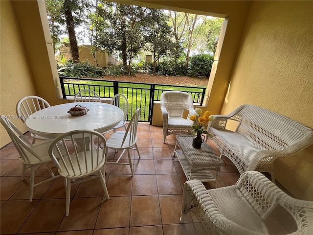 16101 Emerald Estates Dr Unit 143, Weston, FL 33331 - balcony featuring outdoor dining area