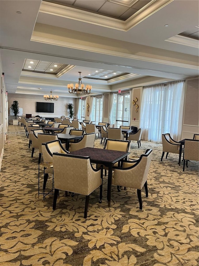 16101 Emerald Estates Dr Unit 143, Weston, FL 33331 - dining area featuring a raised ceiling, crown molding, a chandelier, and carpet