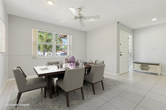 dining area featuring tile patterned flooring, recessed lighting, ceiling fan, and baseboards