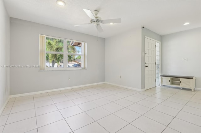 unfurnished room featuring recessed lighting, baseboards, light tile patterned flooring, and a ceiling fan