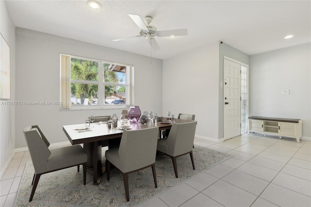 dining room with light tile patterned flooring, recessed lighting, ceiling fan, and baseboards