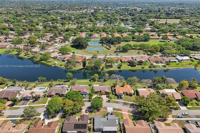 aerial view with a residential view and a water view