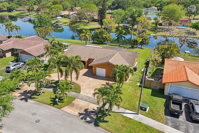 bird's eye view with a water view