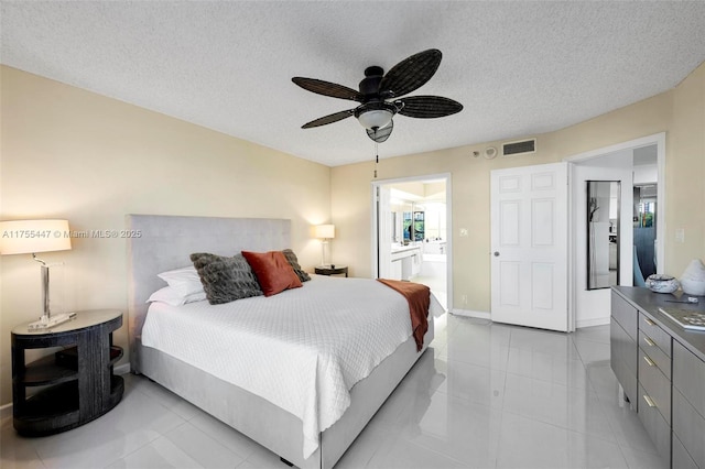 bedroom featuring baseboards, visible vents, ceiling fan, a textured ceiling, and connected bathroom