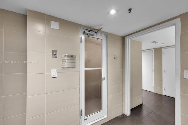 bathroom with tile patterned floors