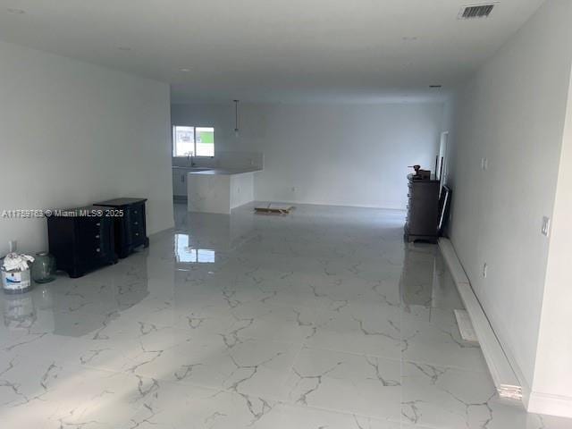 interior space with visible vents and marble finish floor