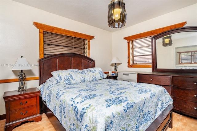 bedroom featuring multiple windows