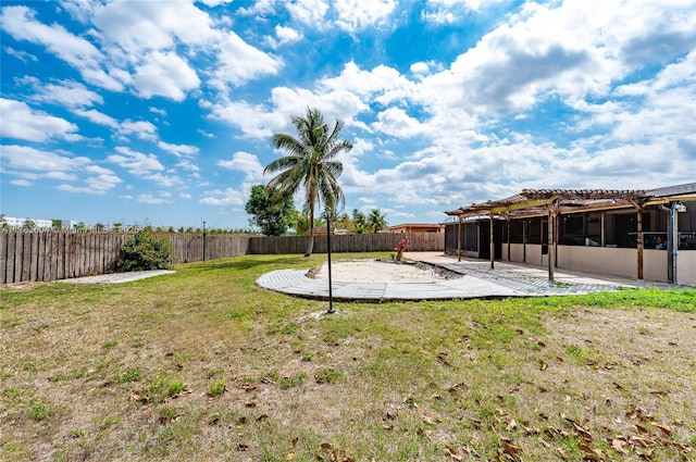 view of yard featuring a patio, a fenced backyard, and a pergola